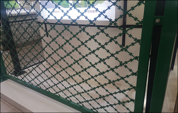 Galvanized and green coated razor wire welded mesh fencing panels